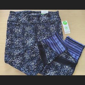 Gaiam The Om Fit workout/yoga capri leggings, purple & black, size large, NWT